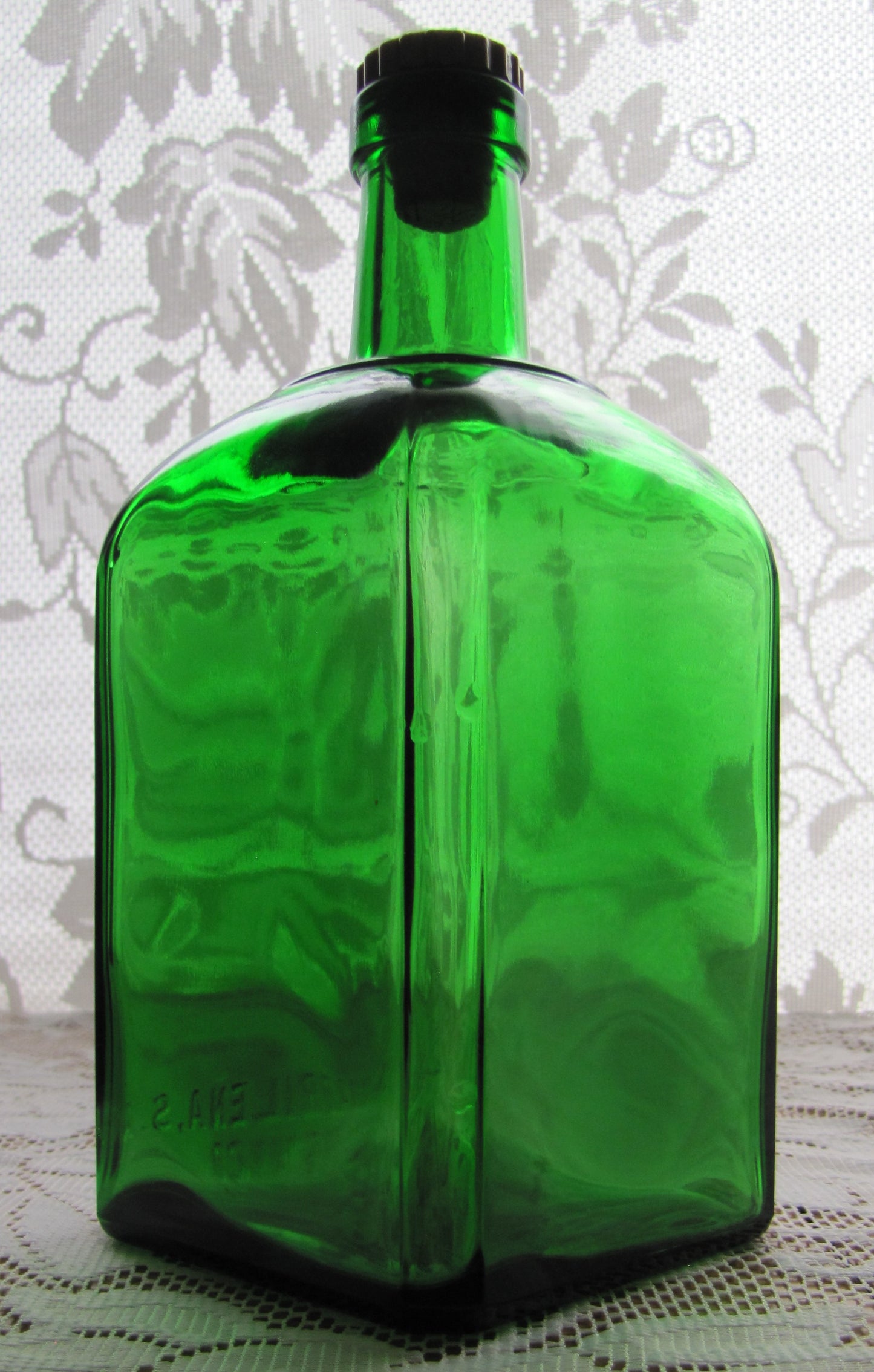 Vintage; Green Tequila bottle with stopper, markings "LA MADRILENA,S.A.  MEXICO"