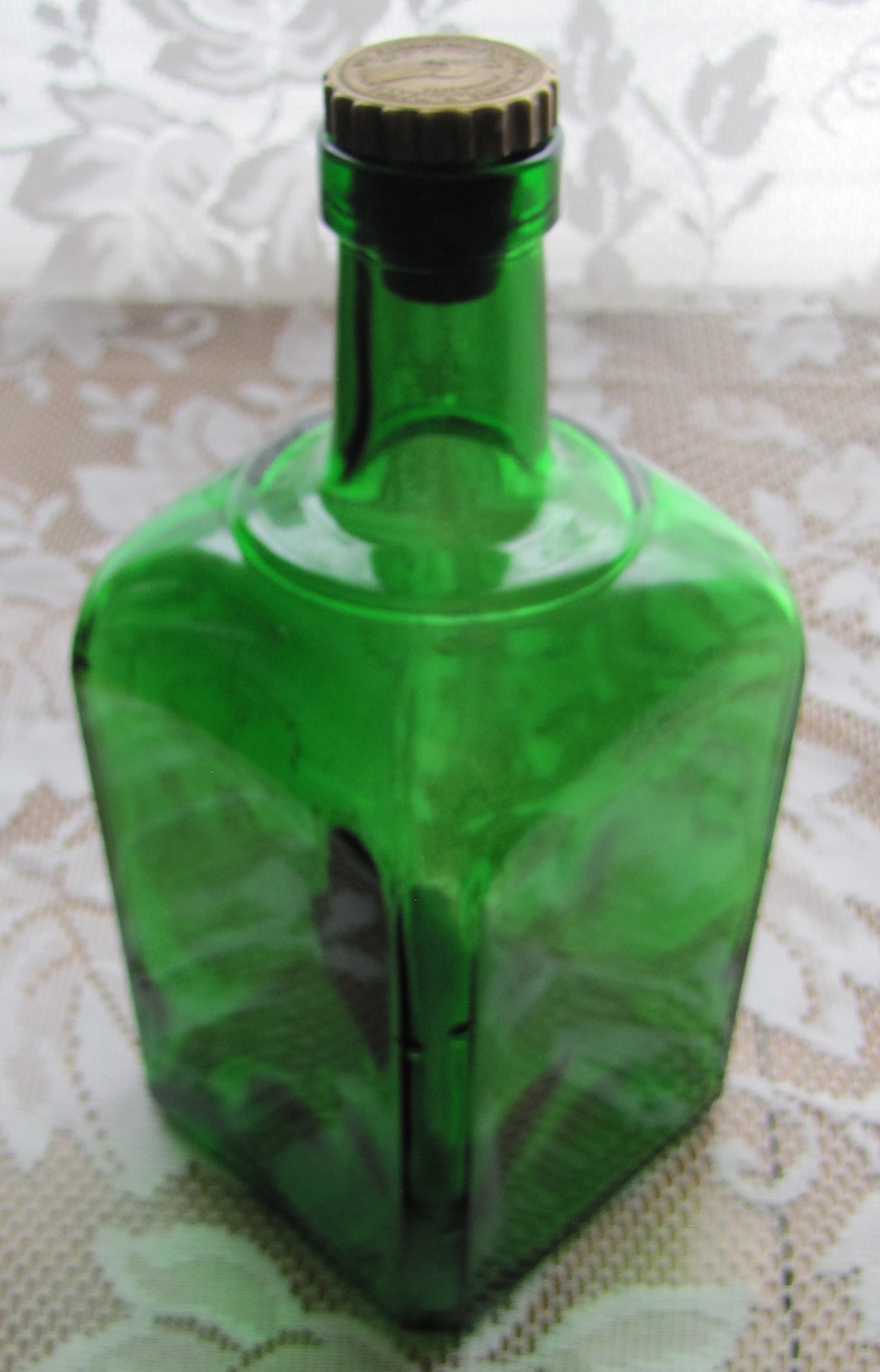 Vintage; Green Tequila bottle with stopper, markings "LA MADRILENA,S.A.  MEXICO"