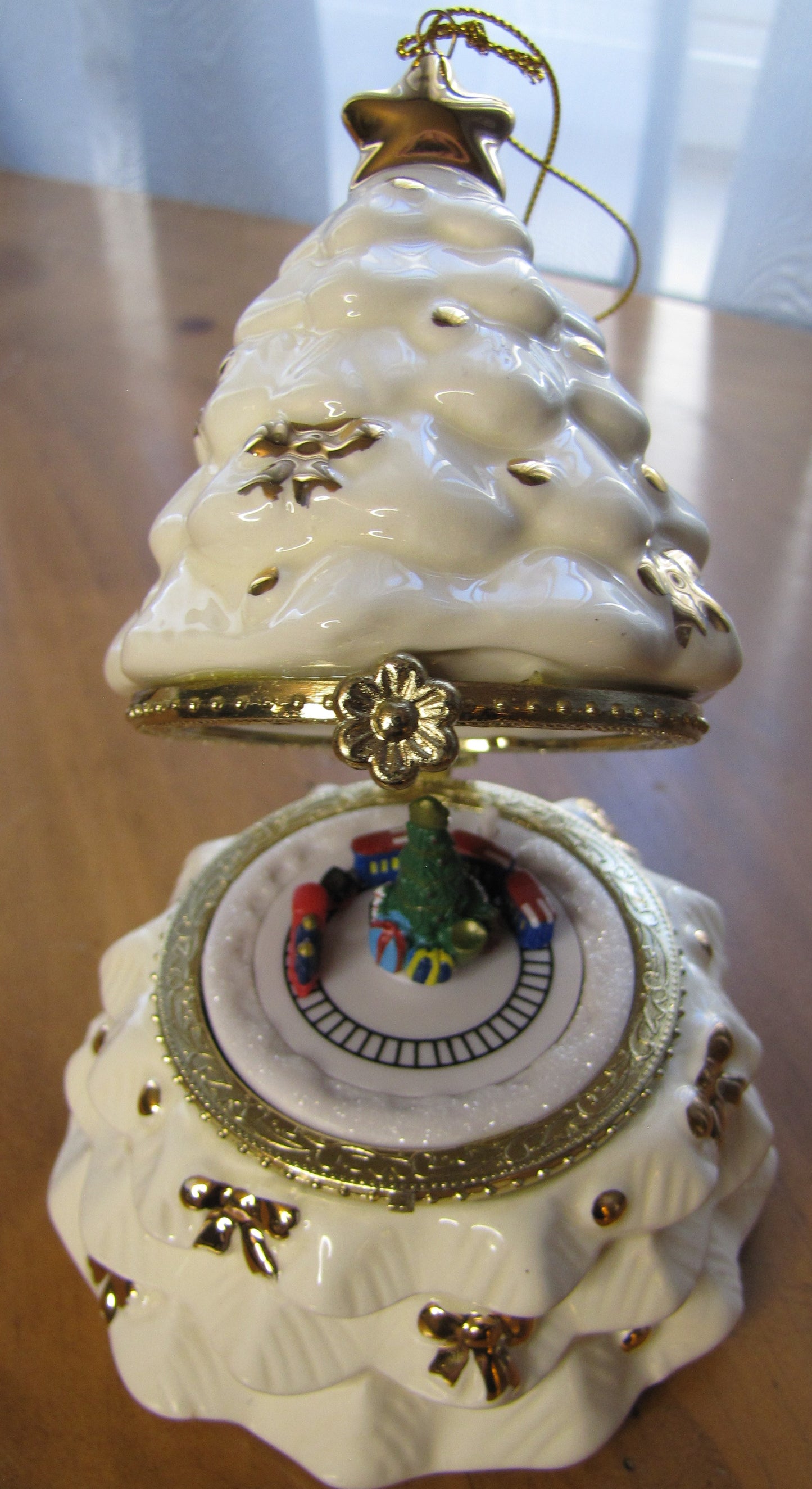 2010 Mr Christmas Gold Edition Porcelain Music Box Set of 4, Tree, Snowman, Angel, Train.  Batch 6447, white with gold trim and box.