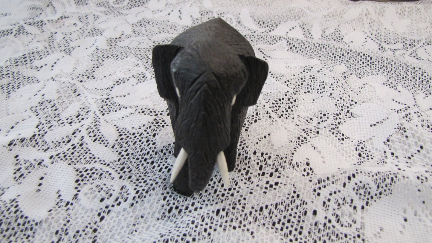 Vintage; hand carved Wooden Elephant , white tusks, 4"T x 4"W